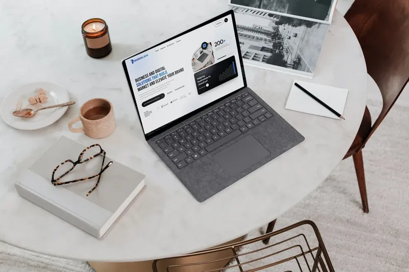 The Oasis Digital Media website on a laptop
